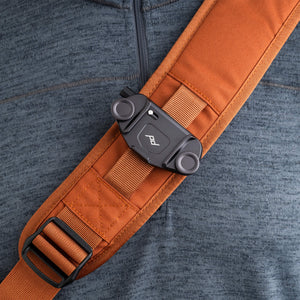Camera clip rail on the shoulder strap supports popular attachment systems