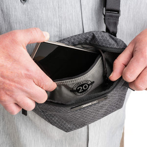 Microfiber-lined stash pocket for phones or power banks.