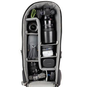 Alternatively carries a large kit consisting of two gripped bodies attached to lenses, plus room for an additional 2-6 lenses and/or accessories