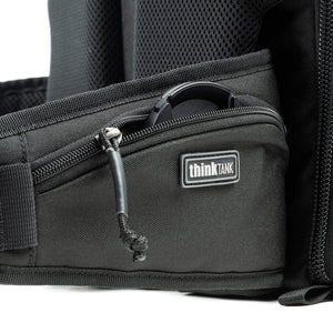 Zippered pocket on waist belt secures small items