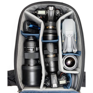 Holds 2 gripped DSLRs with 6–8 standard zoom lenses and 1–2 flashes.