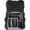 Canon R5 attached to 16-28mm f/2.8, 50mm f/1.4 and accessories. Configured for side access.