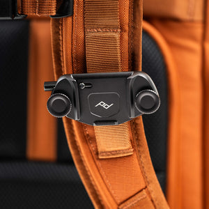 Both shoulder straps feature a camera clip attachment rail