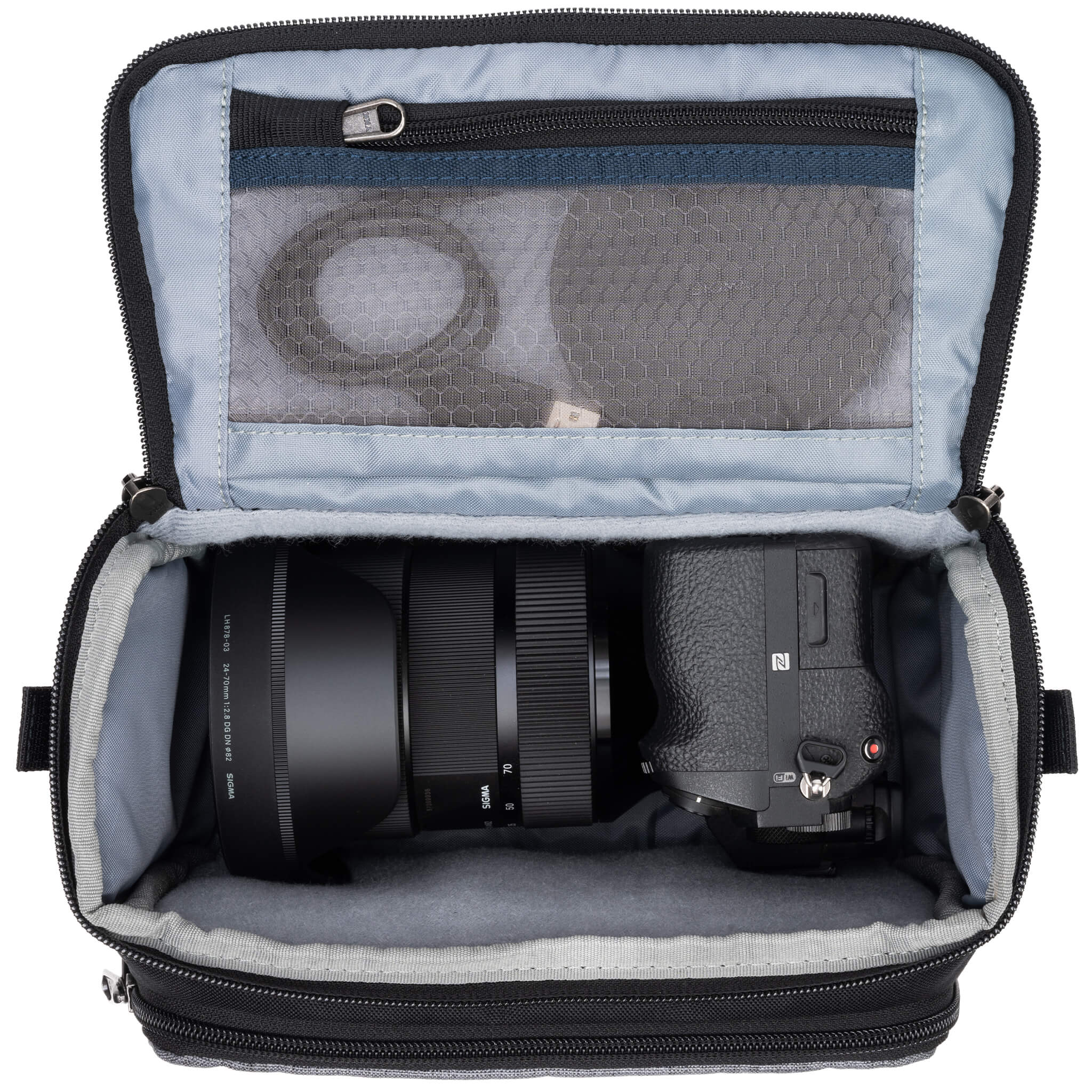 Fits one standard mirrorless body plus 1 to 2 lenses: short to medium f/4 zooms or short to medium primes.