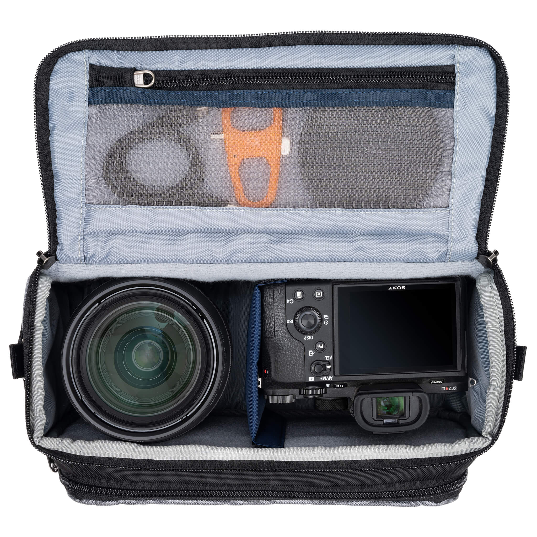 Fits one standard mirrorless body plus 2 to 3 lenses: short to medium f/4 zooms or short to medium primes.