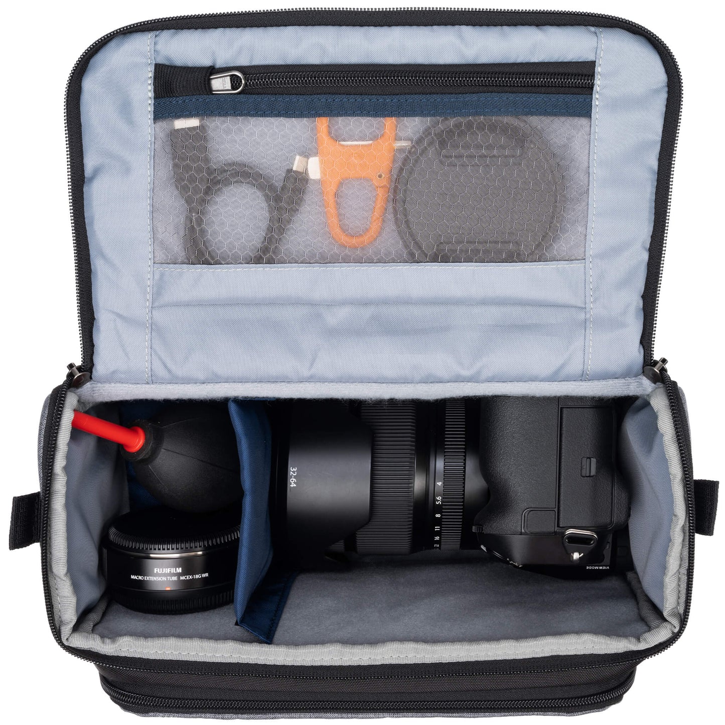 Fits one standard mirrorless body plus 2 to 4 lenses: short to medium f/4 and f/2.8 zooms or short to medium primes.