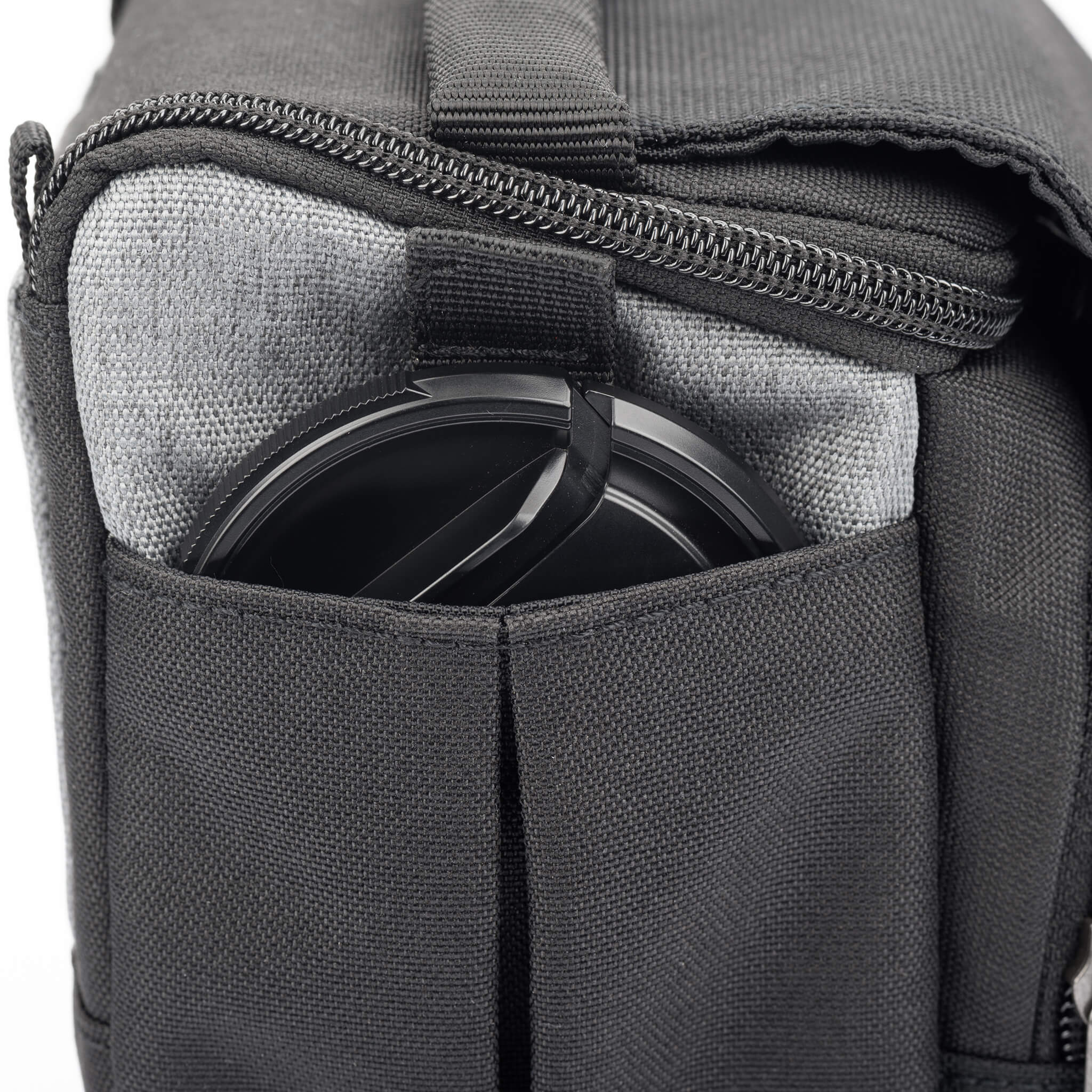 Flip-top lid with magnetic closure provides quick access to gear