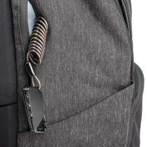 Small, zippered side pocket with security cable and lock