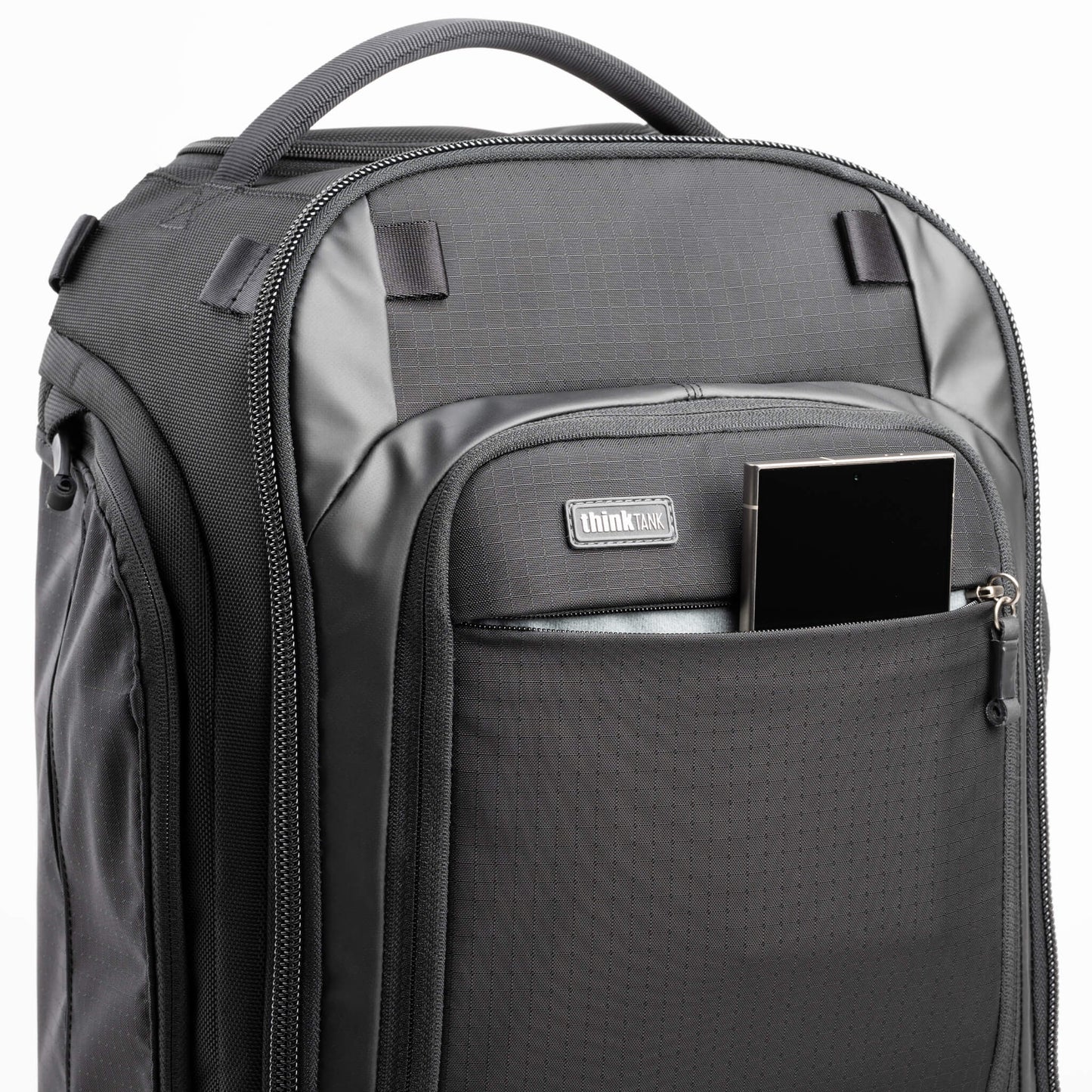 Dedicated quick-access zippered phone pocket lined with microfiber