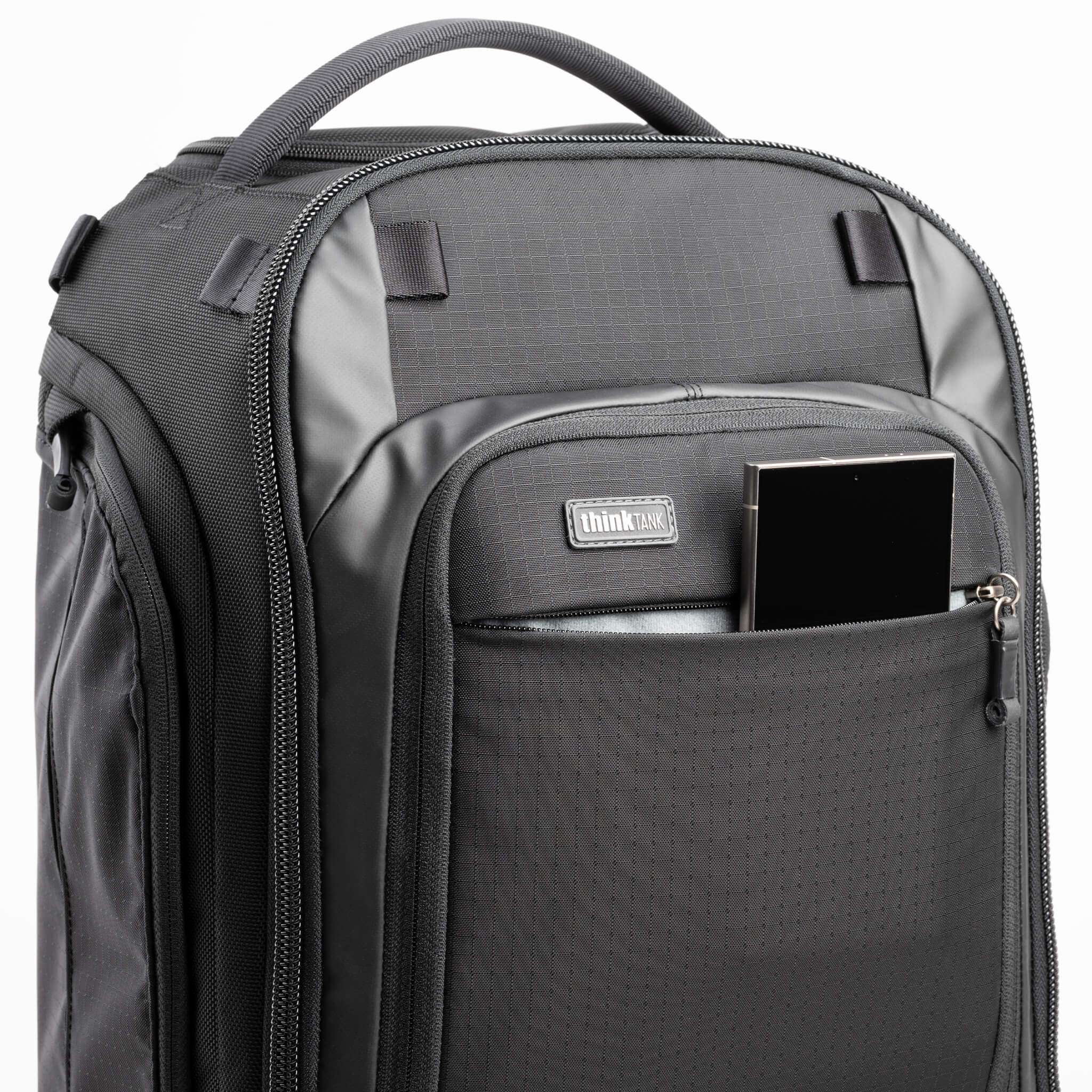Dedicated quick-access zippered phone pocket lined with microfiber
