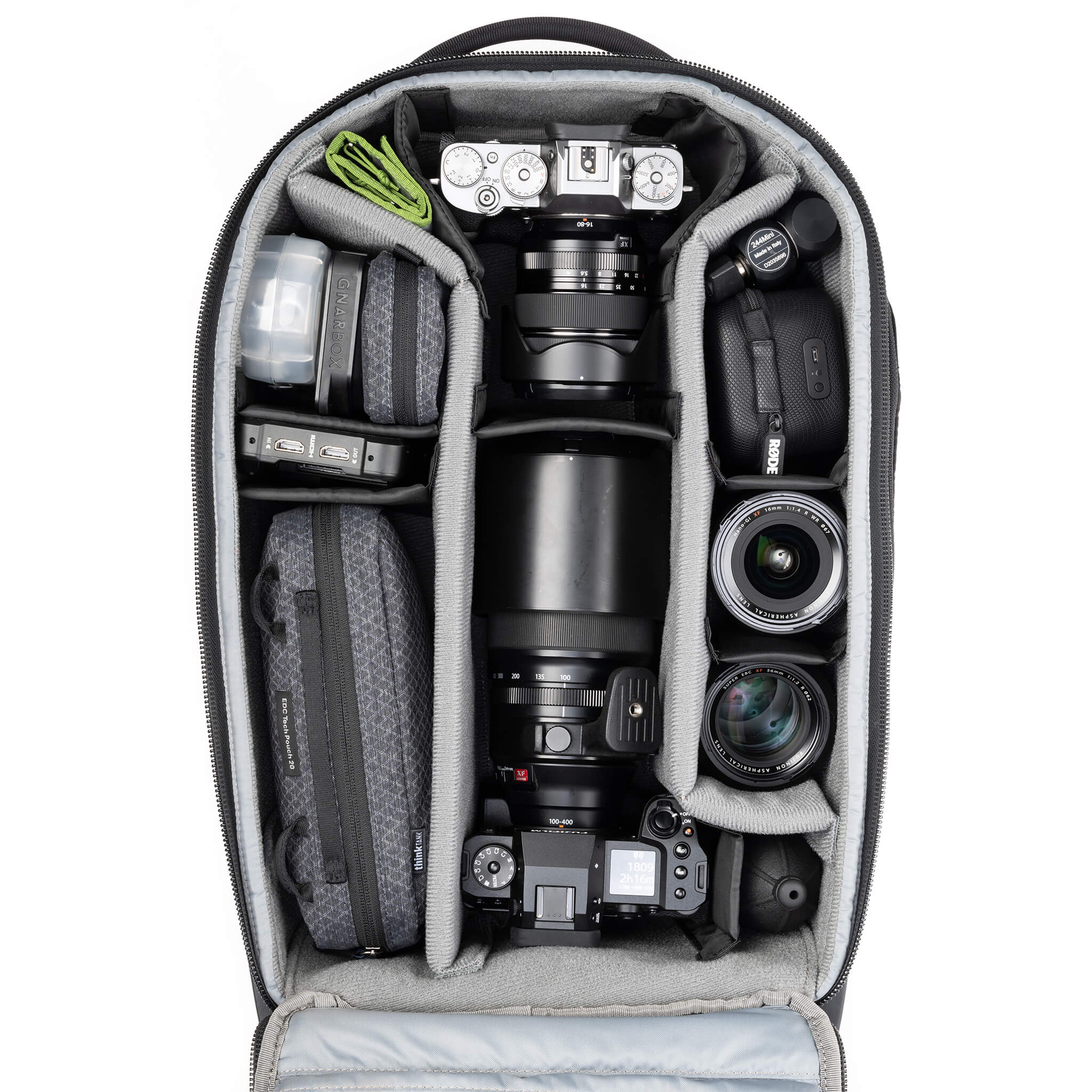 Fits 1 gripped body plus one standard-size body attached to lenses, plus an additional 4-6 lenses and accessories.