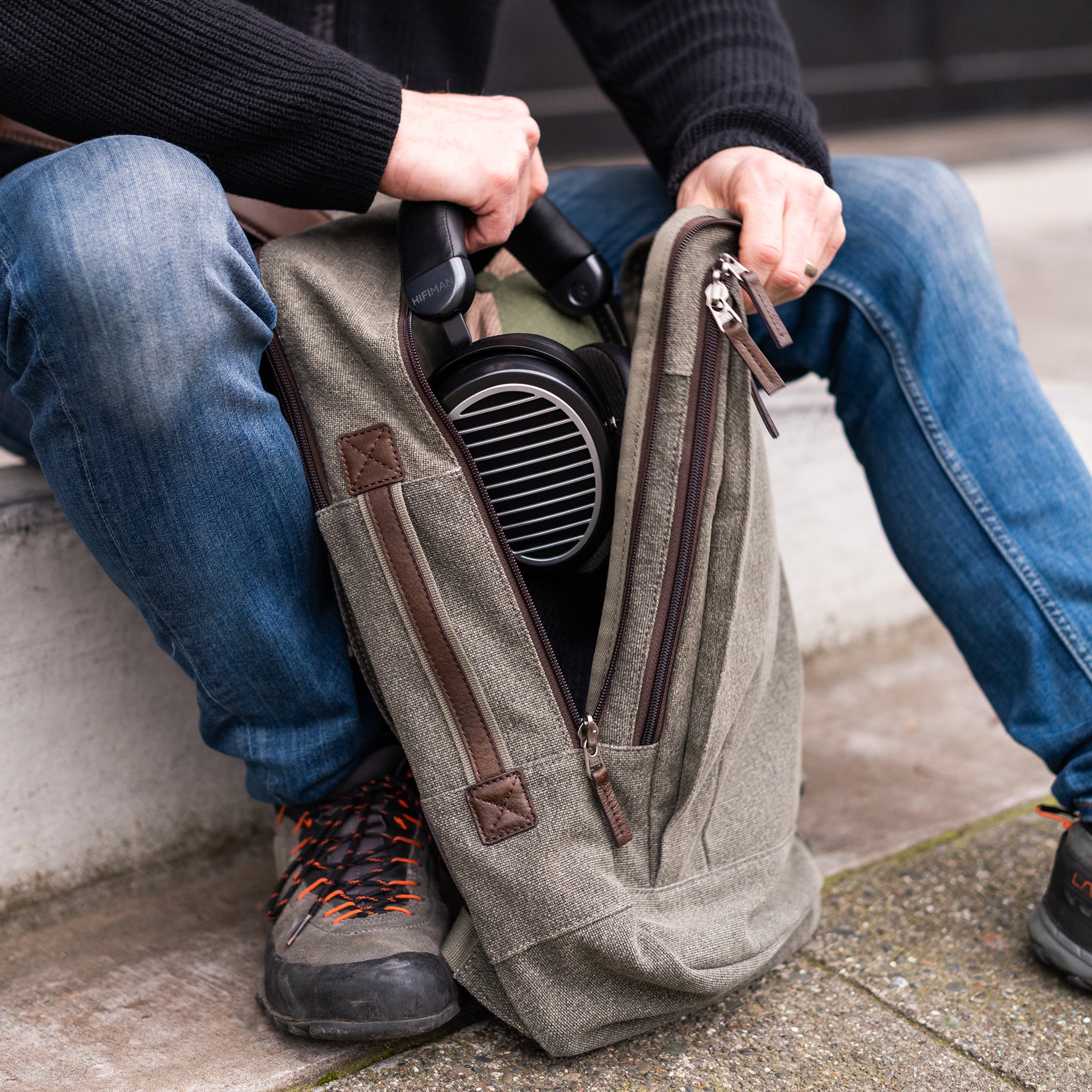 Main compartment sized to fit a pair of shoes, water bottle and light jacket.