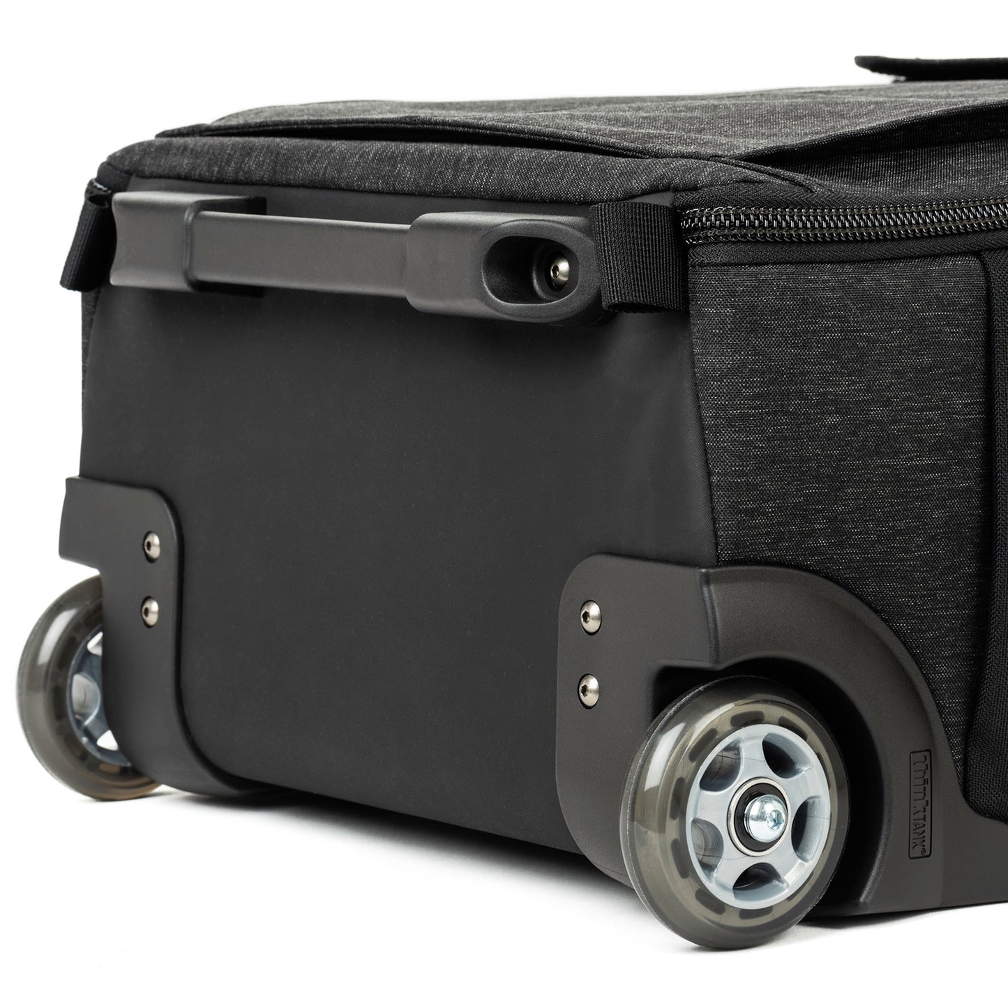 User replaceable retractable handle, wheels, wheel housings, and front foot