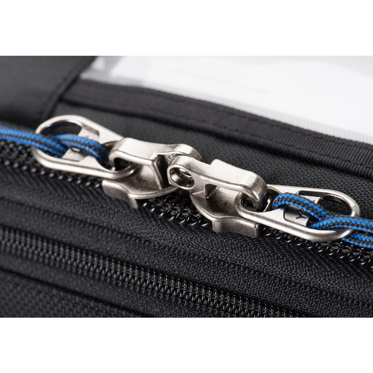 Cable and combination lock included for securing the lockable zippers