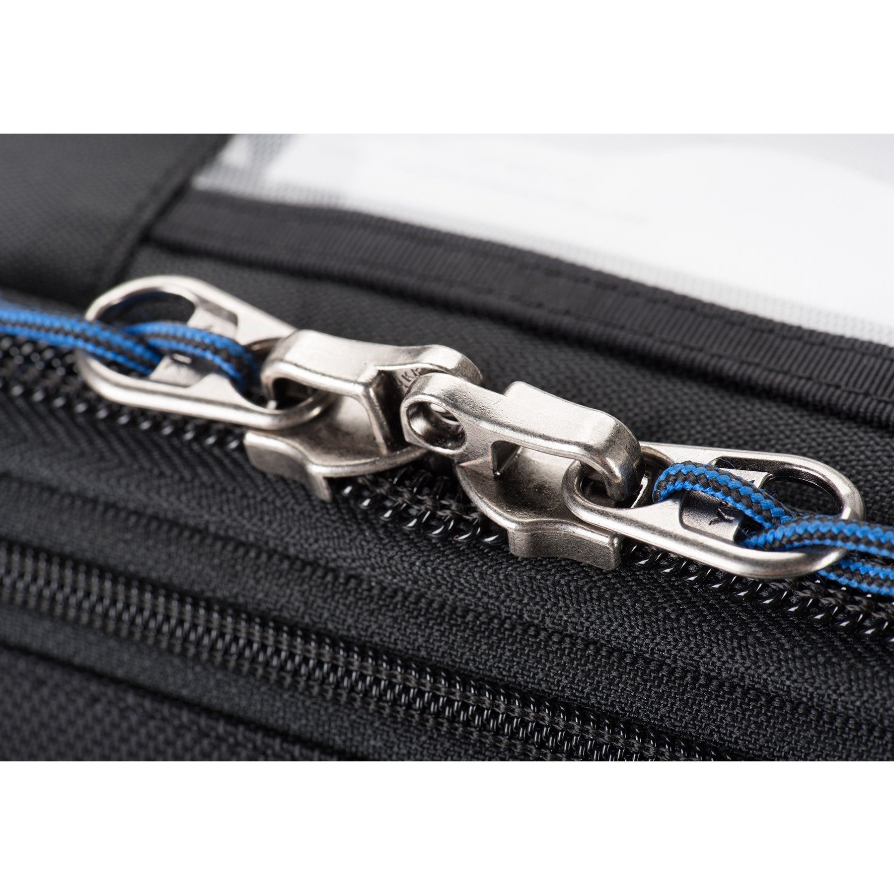 Cable and combination lock included for securing the lockable zippers