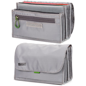 Removable filter insert includes zippered pocket and top flap
