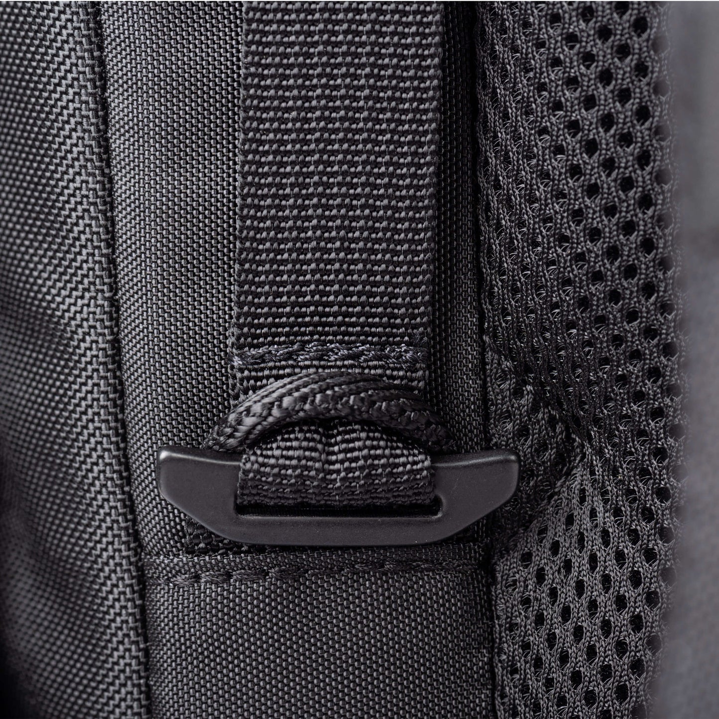 Detail of removable top pocket attachment point