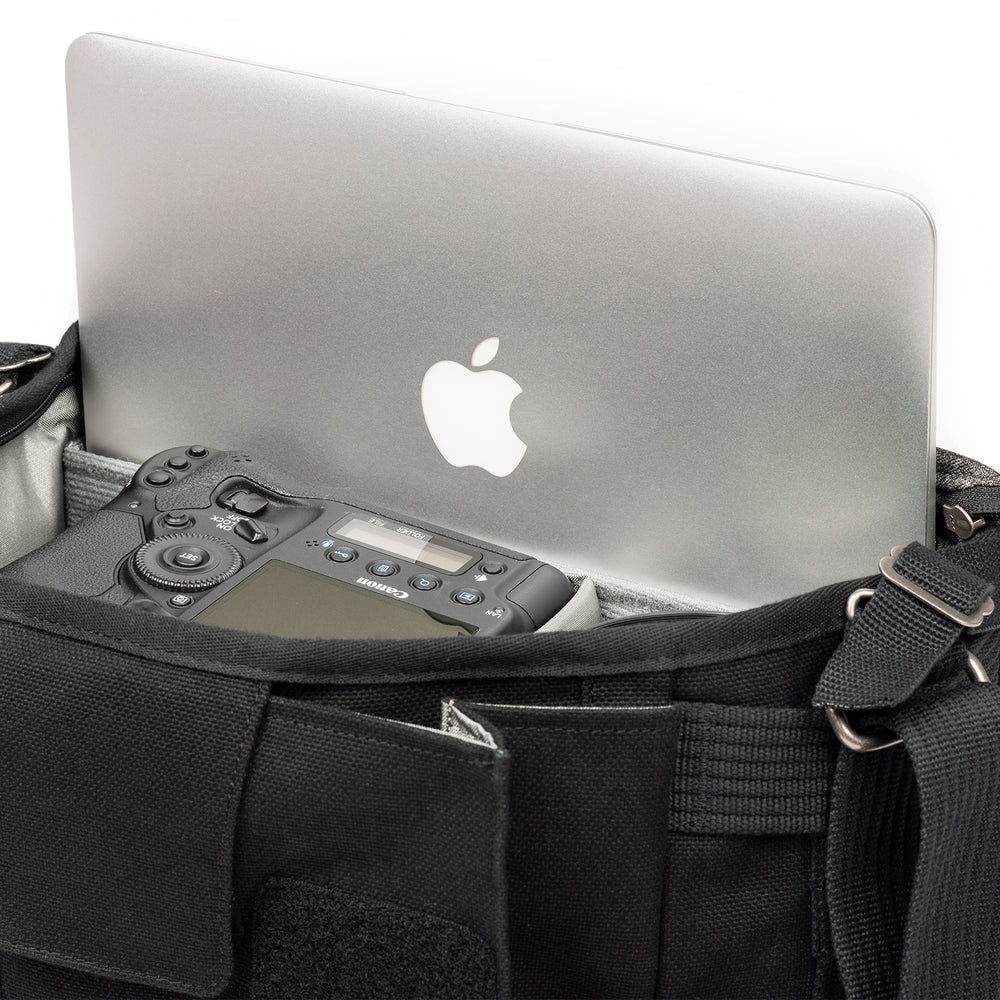 
                  
                    Dedicated pockets fit a 10" tablet and 12" laptop
                  
                