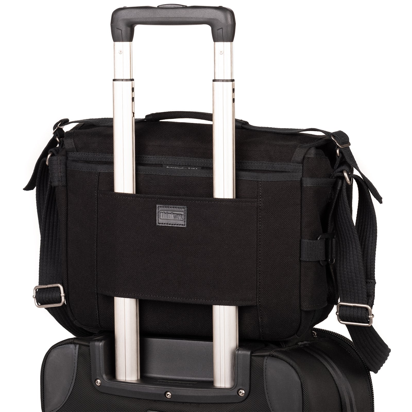 Luggage handle pass-through