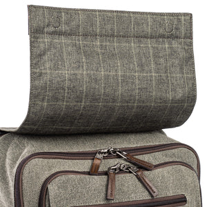 Quick-flip magnetic flap covers zippers for security and weather protection.