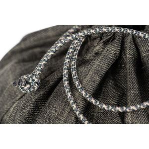 Drawstring cord closure secures contents and doubles as carry loops