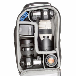 StreetWalker backpacks are designed to accommodate standard DSLR bodies with lenses attached