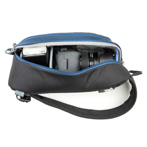 Fits a standard size DSLR + 1–2 lenses + 8” tablet