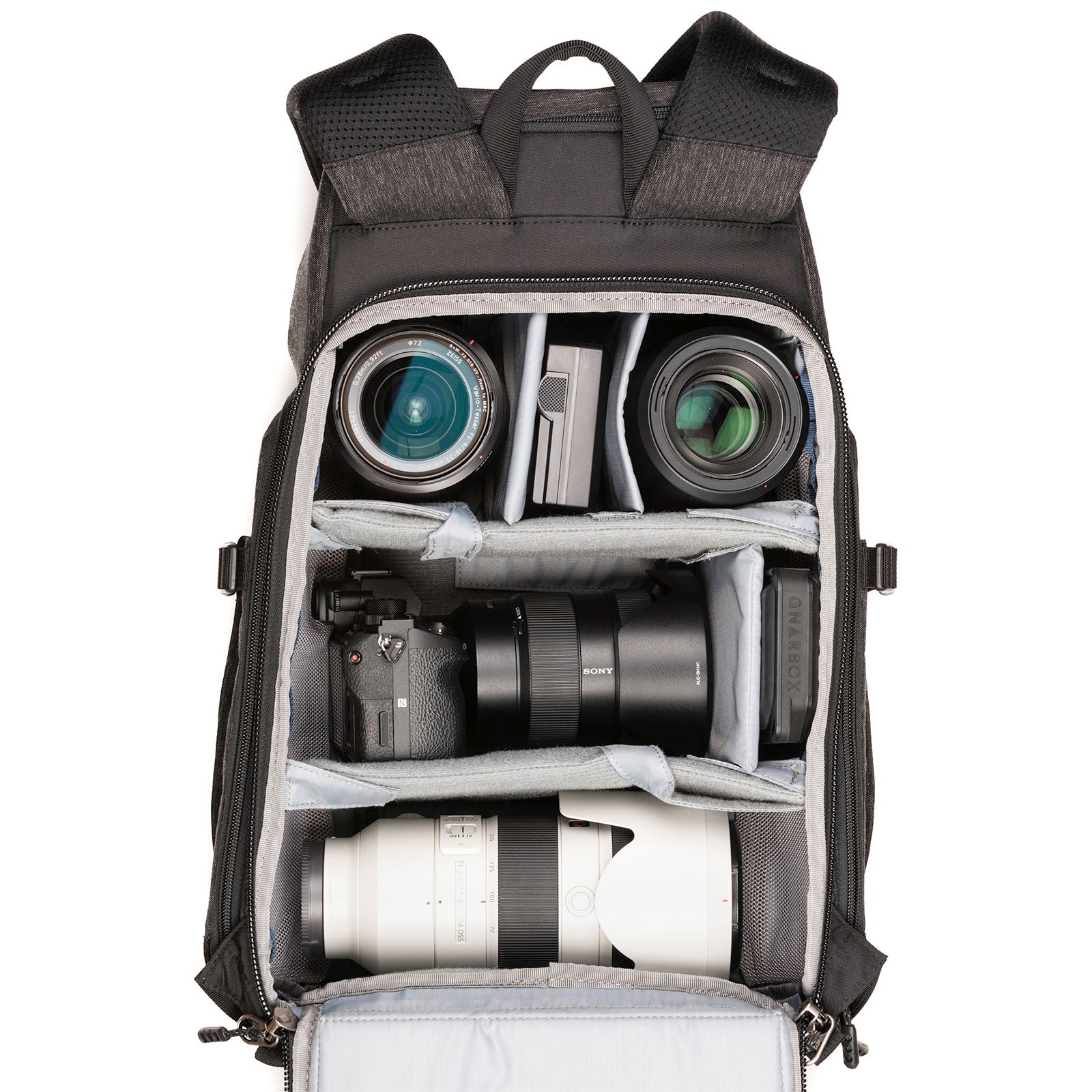 Sony a7rIII with 24–70mm f/2.8 attached, 70–200mm f/2.8, 16–35mm f/2.8, 13” laptop and 90mm f/2.8 macro