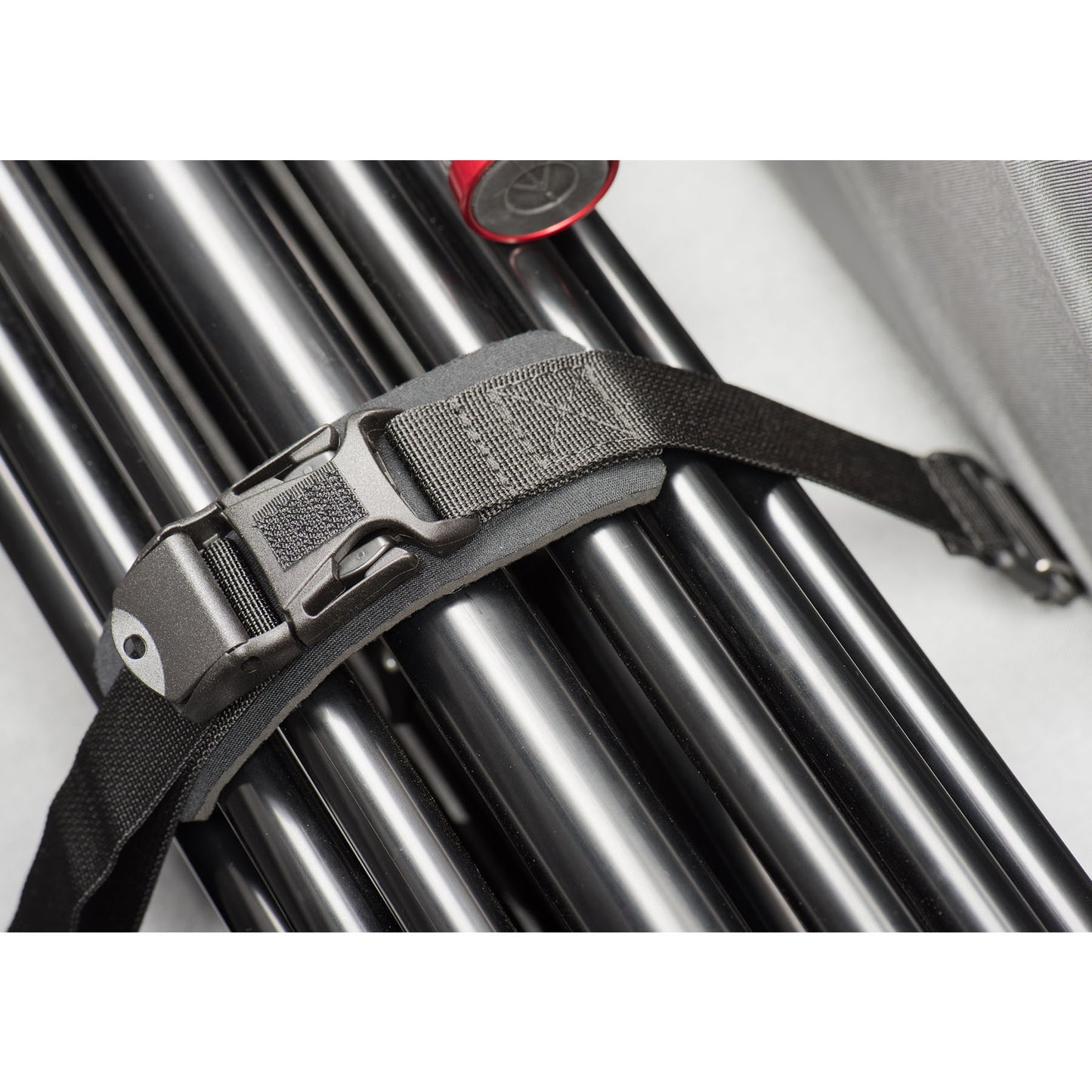 Multiple tie-down straps secure your tripod, stands or slider when transporting between locations