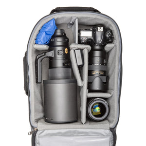 2 gripped DSLRs with lenses attached plus 2–4 additional lenses, 15” laptop and a 10” tablet