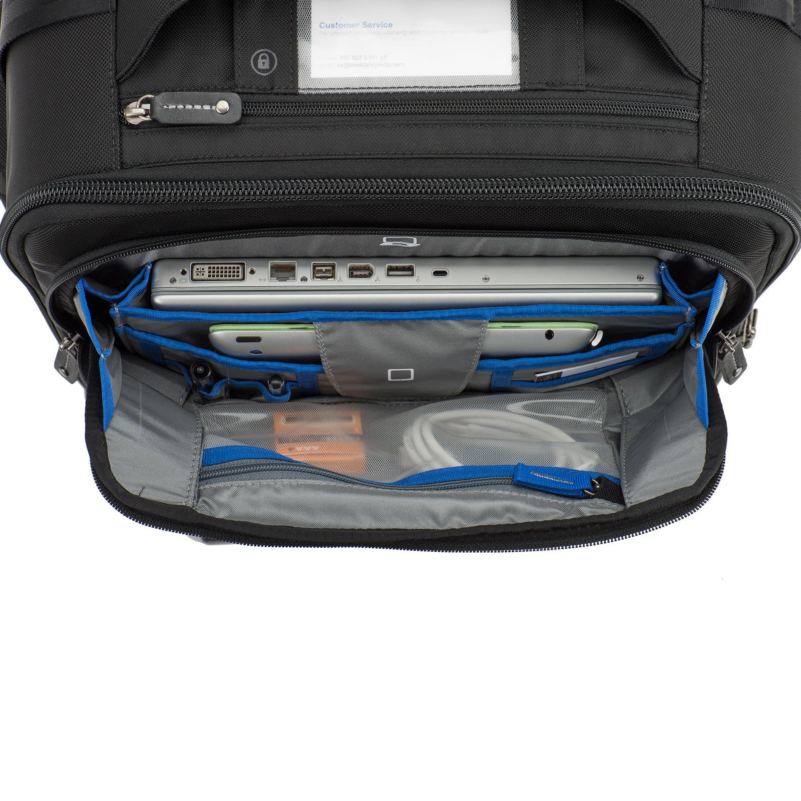 Dedicated padded laptop and tablet compartments located in a lockable pocket. Fits 15” laptop and a 10” tablet