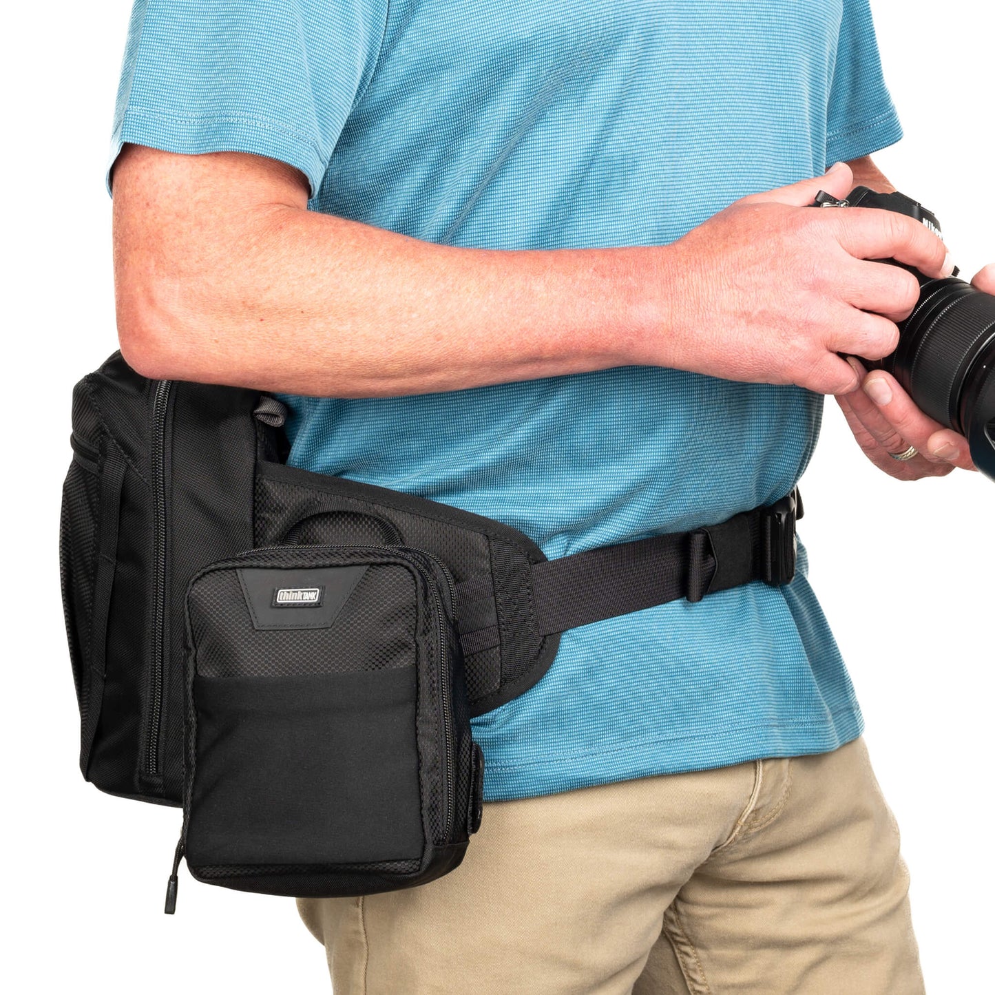 
                  
                    Rail system on waist belt accommodates modular pouches 
                  
                