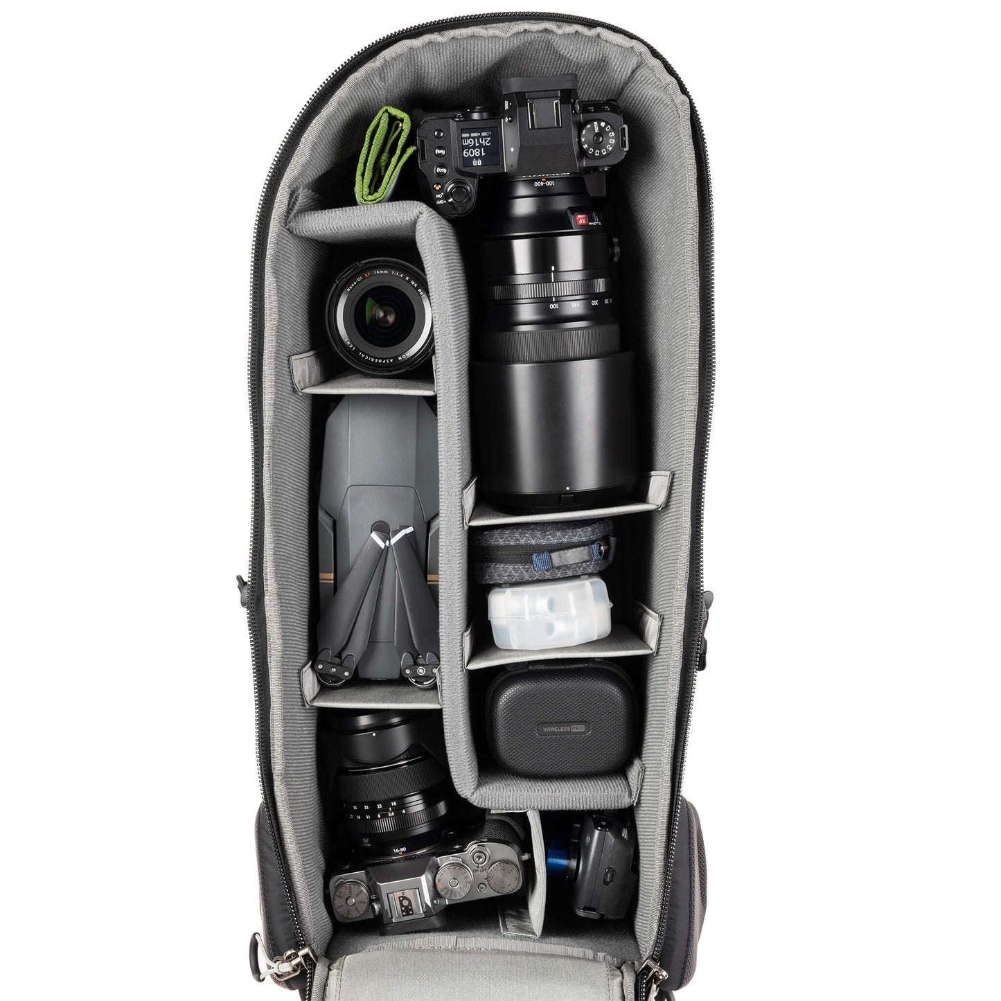 
                  
                    Alternatively carries a large kit consisting of two gripped bodies attached to lenses, plus room for an additional 2-6 lenses and/or accessories
                  
                