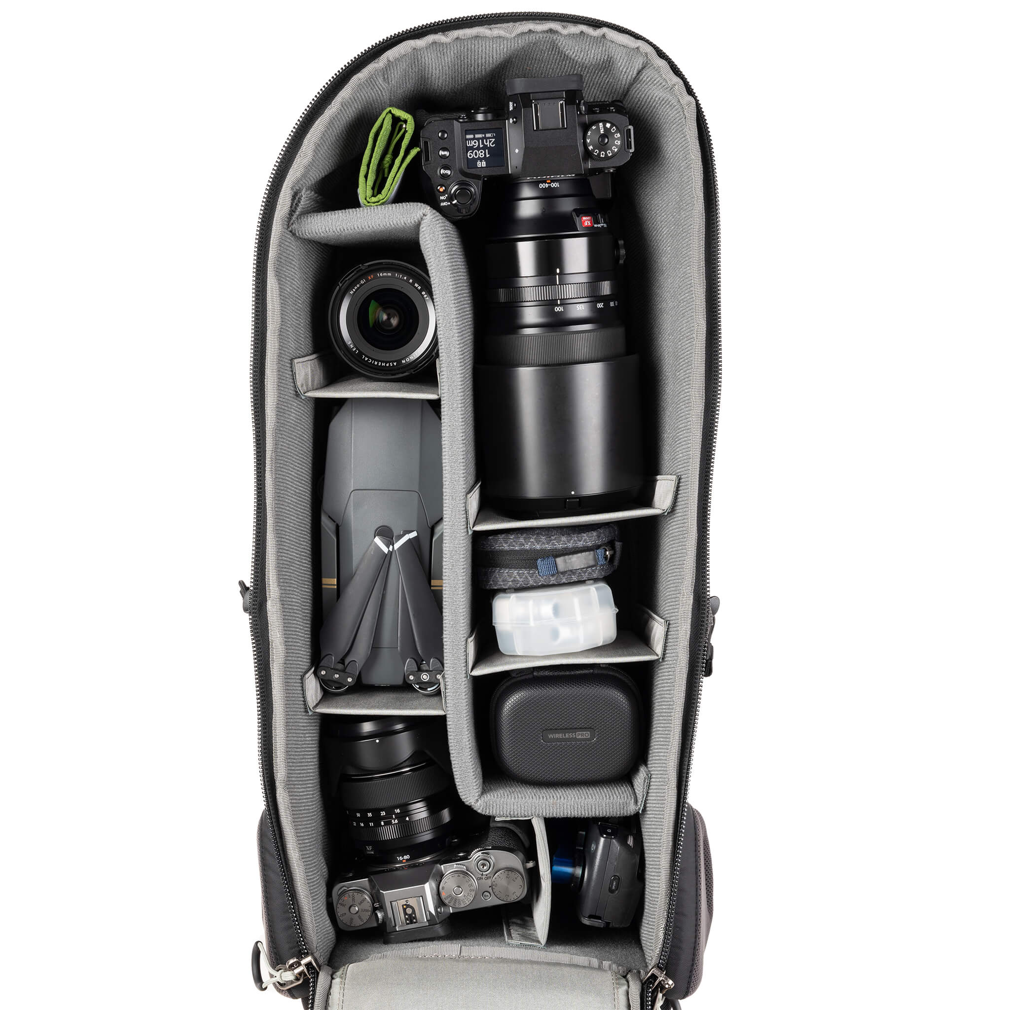 Alternatively carries a large kit consisting of two gripped bodies attached to lenses, plus room for an additional 2-6 lenses and/or accessories
