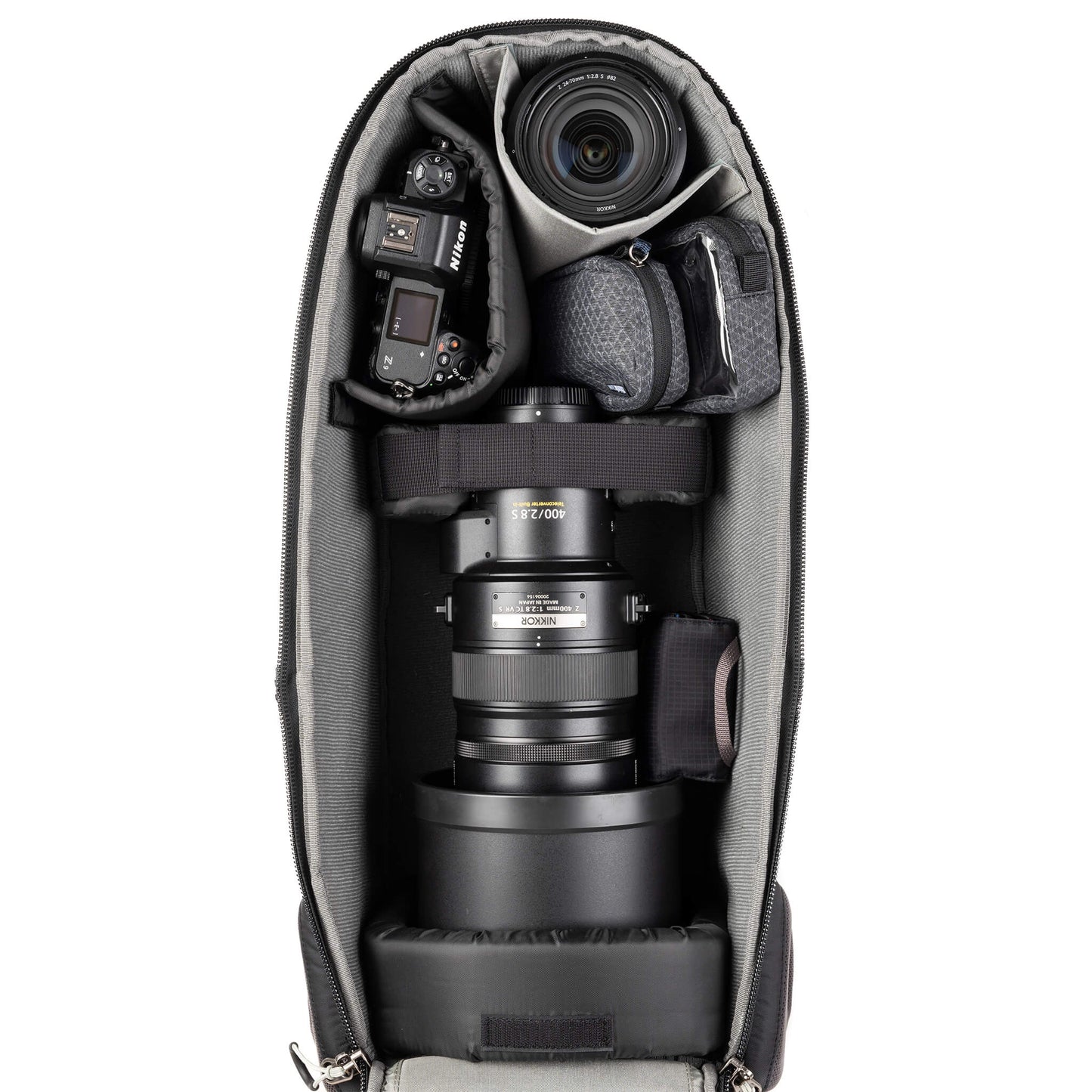 
                  
                    400mm f/4.0 with gripped body dettached plus and extra lens
                  
                