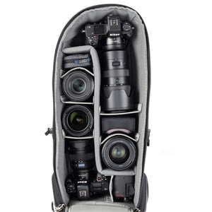 Alternatively carries a large kit consisting of two gripped bodies attached to lenses, plus room for an additional 2-6 lenses and/or accessories