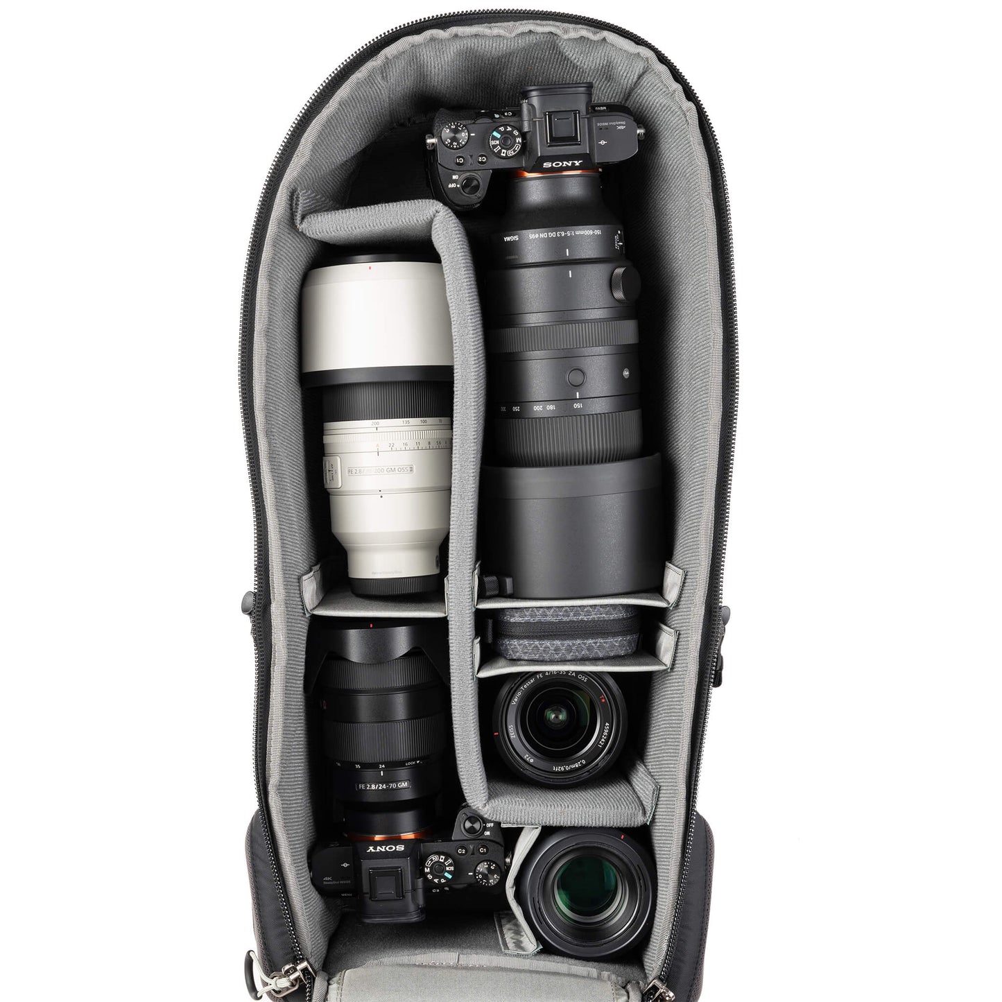 
                  
                    Alternatively carries a large kit consisting of two gripped bodies attached to lenses, plus room for an additional 2-6 lenses and/or accessories
                  
                