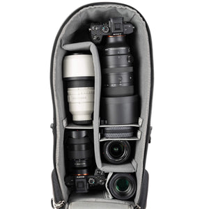 Alternatively carries a large kit consisting of two gripped bodies attached to lenses, plus room for an additional 2-6 lenses and/or accessories