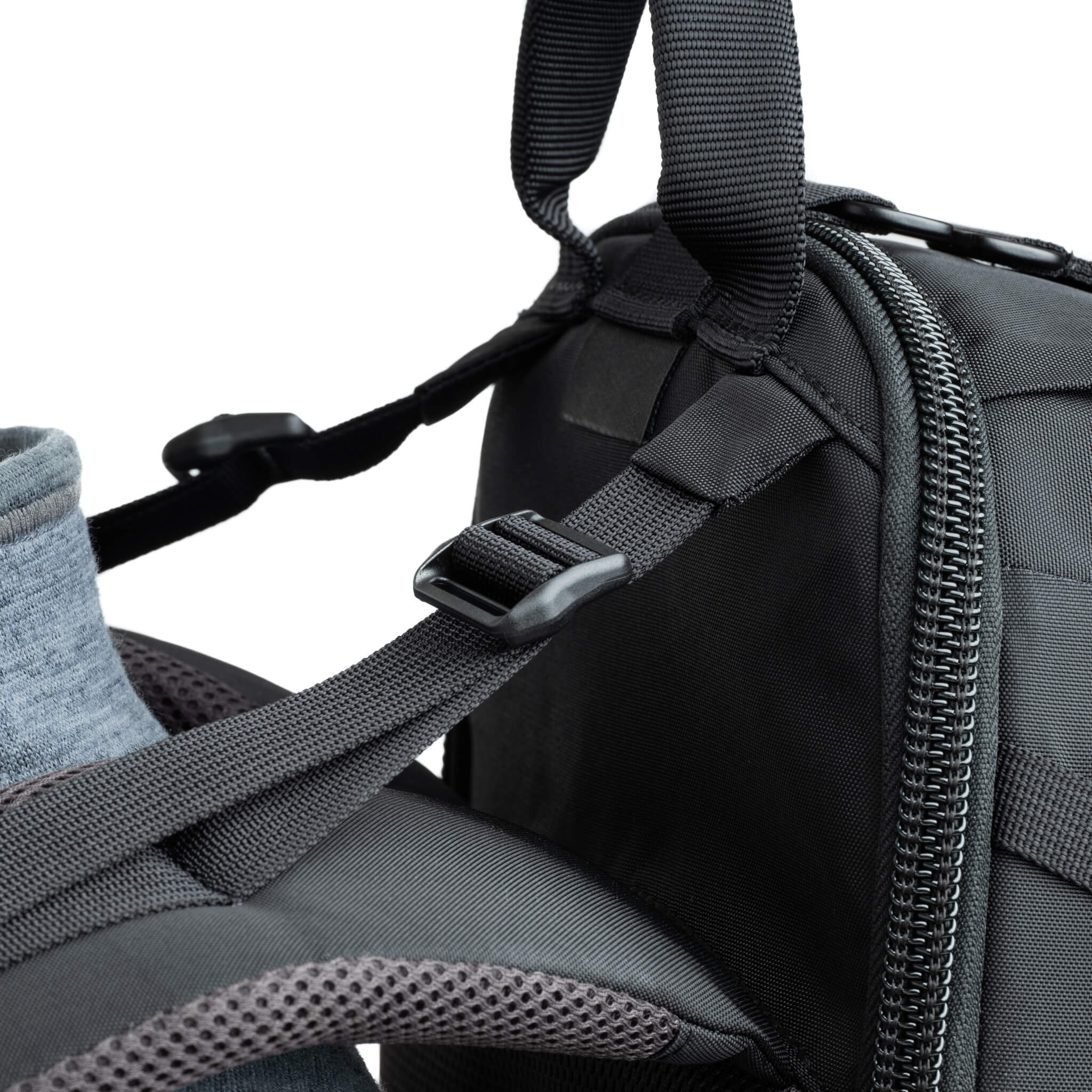 Nine-point adjustable harness system includes load lifters, sternum strap, and quick-fit waist belt
