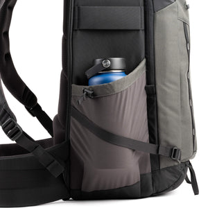 Two stretch pockets on the sides fit water bottles and tripods