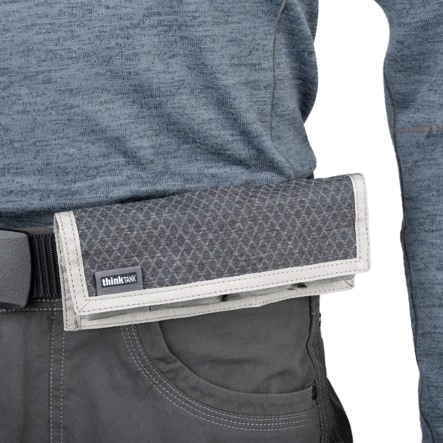 
                  
                    Fits easily in your pocket or attaches to your belt or bags.
                  
                