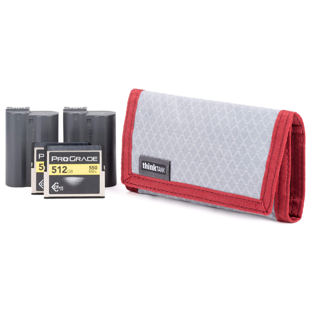 Cards and Power Convenient folding wallet carries both memory cards and batteries in one. No more digging through your bag looking for one or the other! Fits easily in your pocket or attaches to your belt or bags.