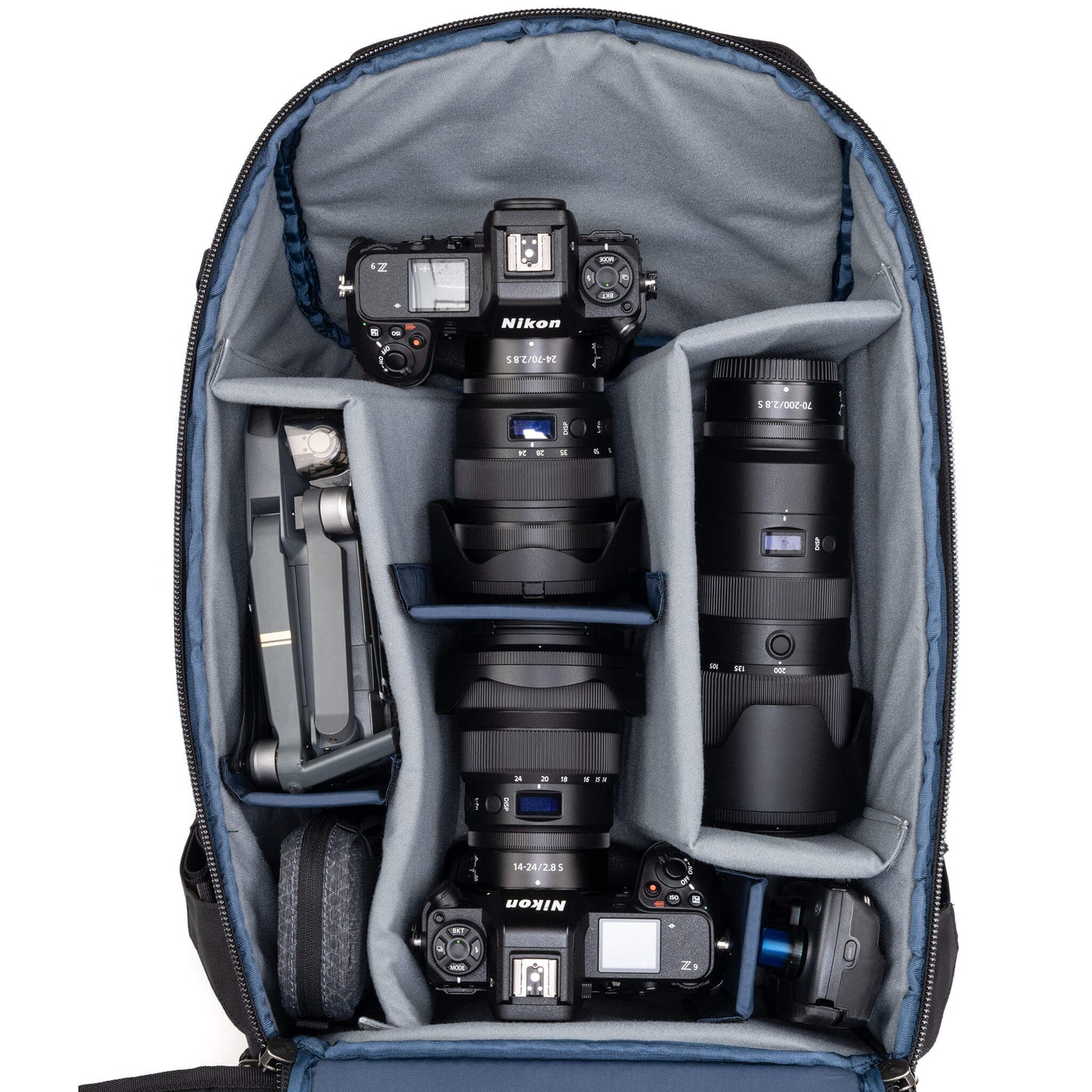 
                  
                    Holds two gripped camera bodies with lenses attached plus 4-6 additional lenses
                  
                