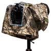 Realtree® APX Camo Emergency Rain Cover on tripod