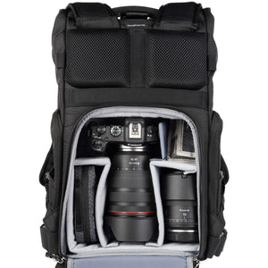 Canon R5 with 24-70mm f/2.8, 50 f/1.4, accessories. Configured for back access.