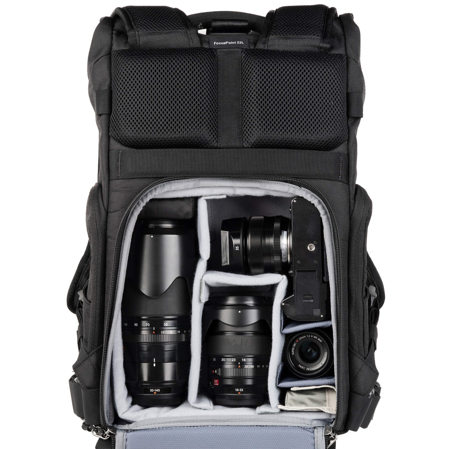
                  
                    Fuji X-T5 attached to 35mm f/1.4, 50-140mm f/2.8, 16-35mm f/2.8, 23mm f/2. Configured for side access.
                  
                