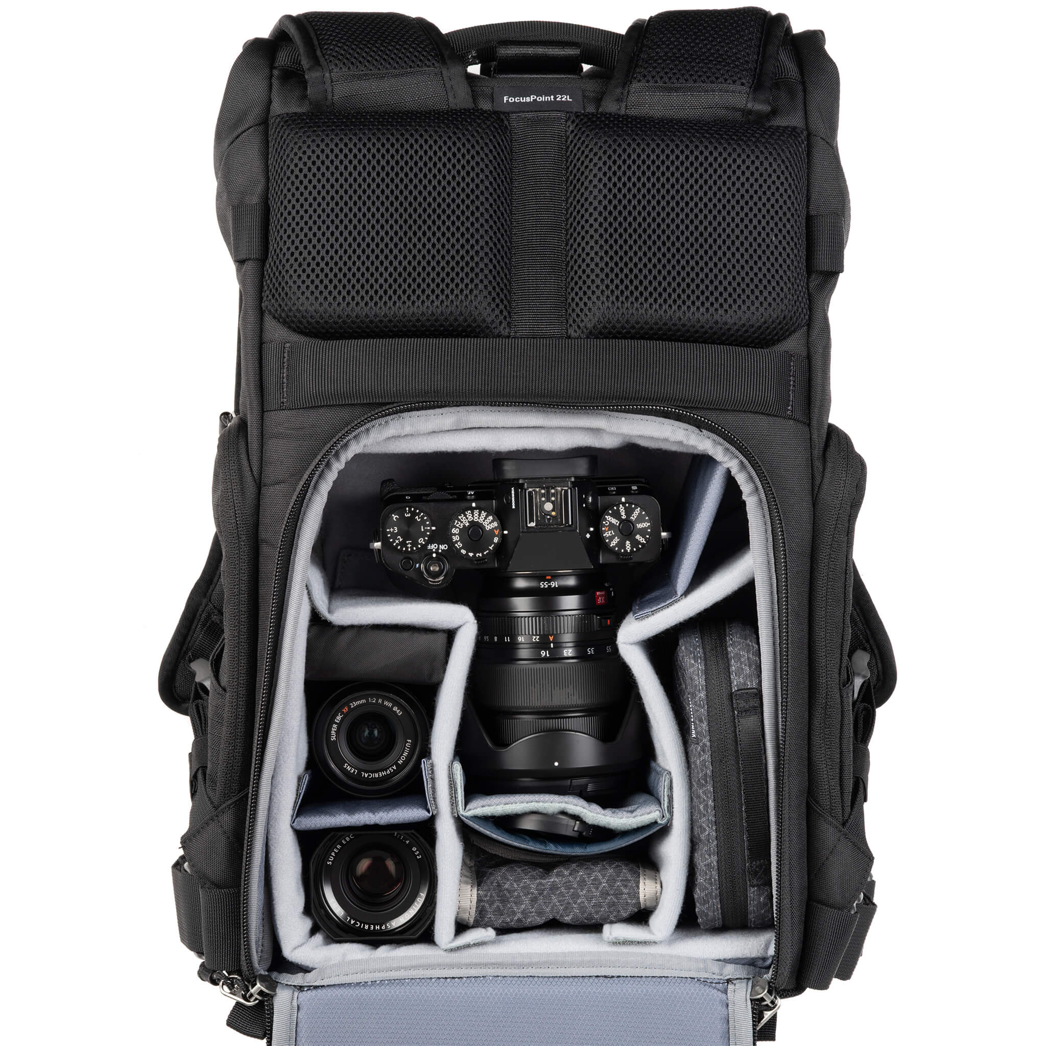 Fuji X-Series X-T5 attached to 16-55mm f/2.8, 23mm f/2, 35mm f/1.4, accessories. Configured for back access. 