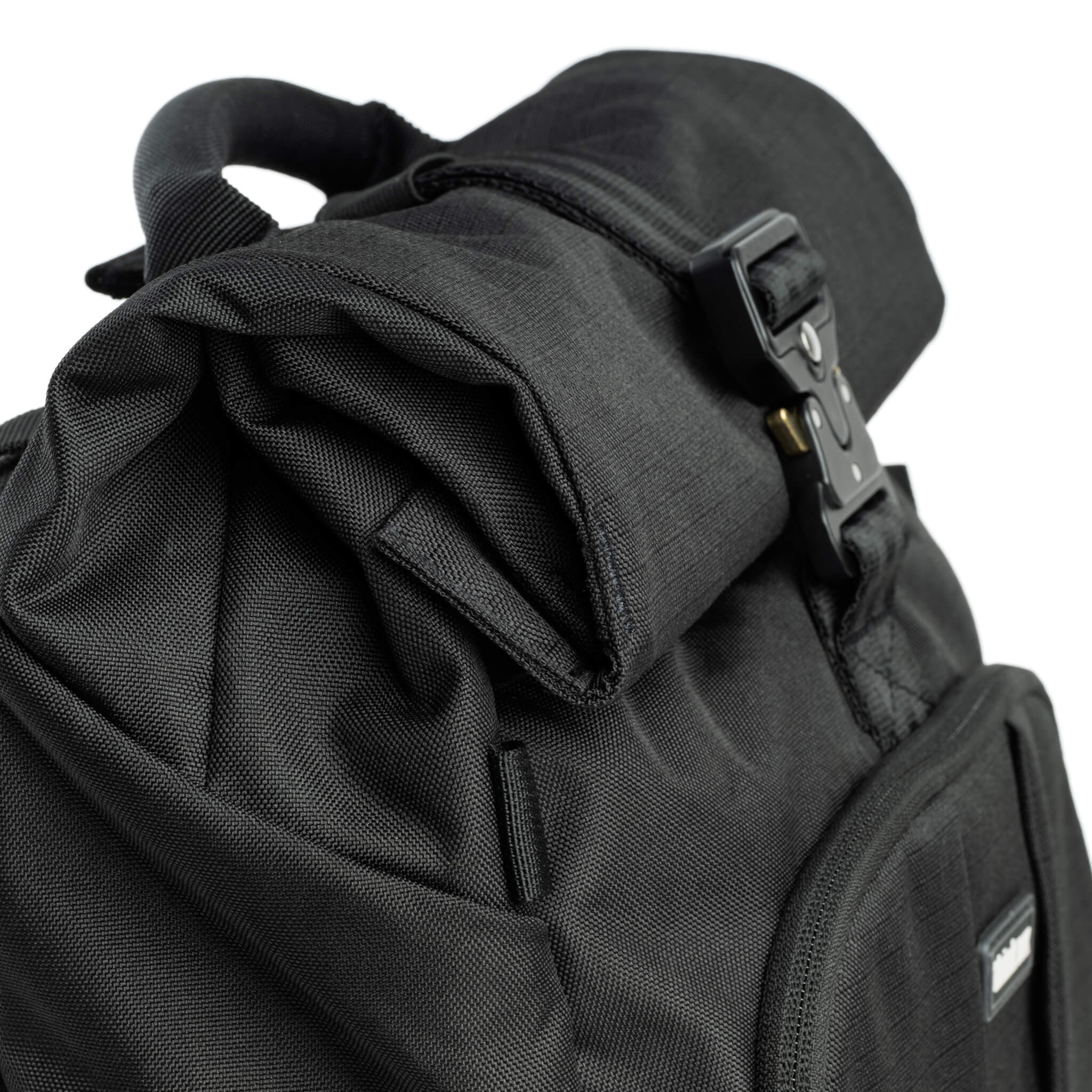 Versatile design with expandable storage, adjustable roll-top, and removable photo insert