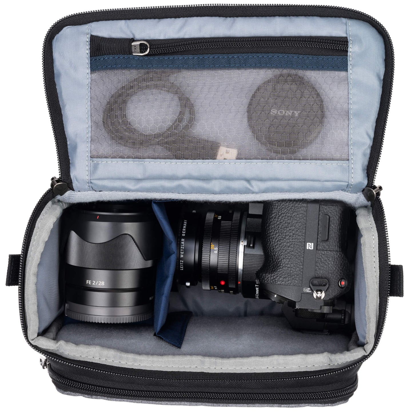 
                  
                    Fits one standard mirrorless body plus 1 to 2 lenses: short to medium f/4 zooms or short to medium primes.
                  
                