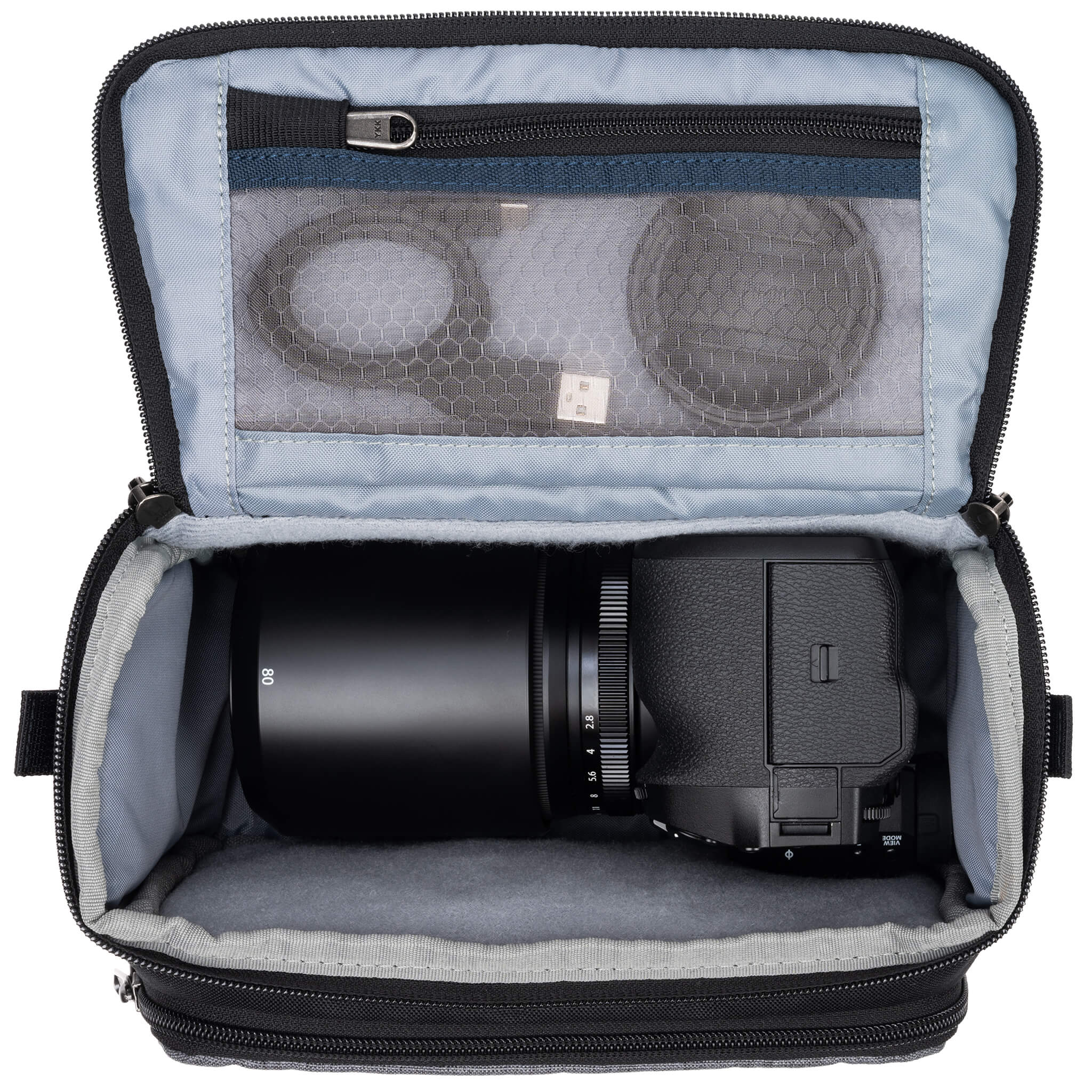 Fits one standard mirrorless body plus 1 to 2 lenses: short to medium f/4 zooms or short to medium primes.